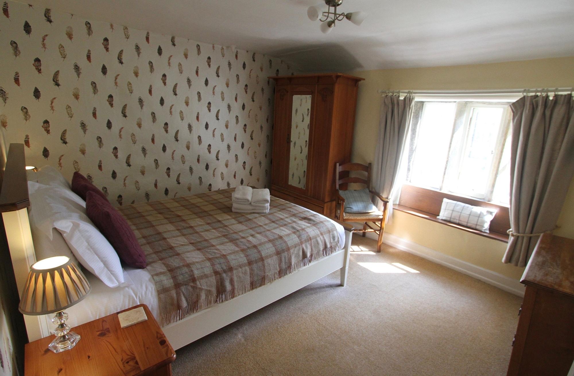 Ashfield House Hotel Grassington Kültér fotó The bedroom at The Old Post Office