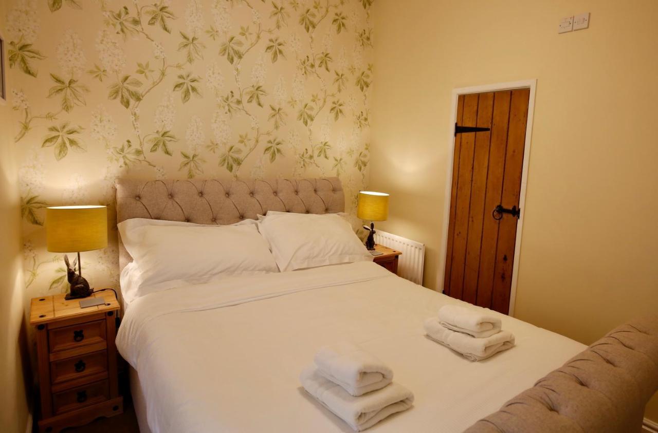 Ashfield House Hotel Grassington Szoba fotó A bedroom at the Old Post Office