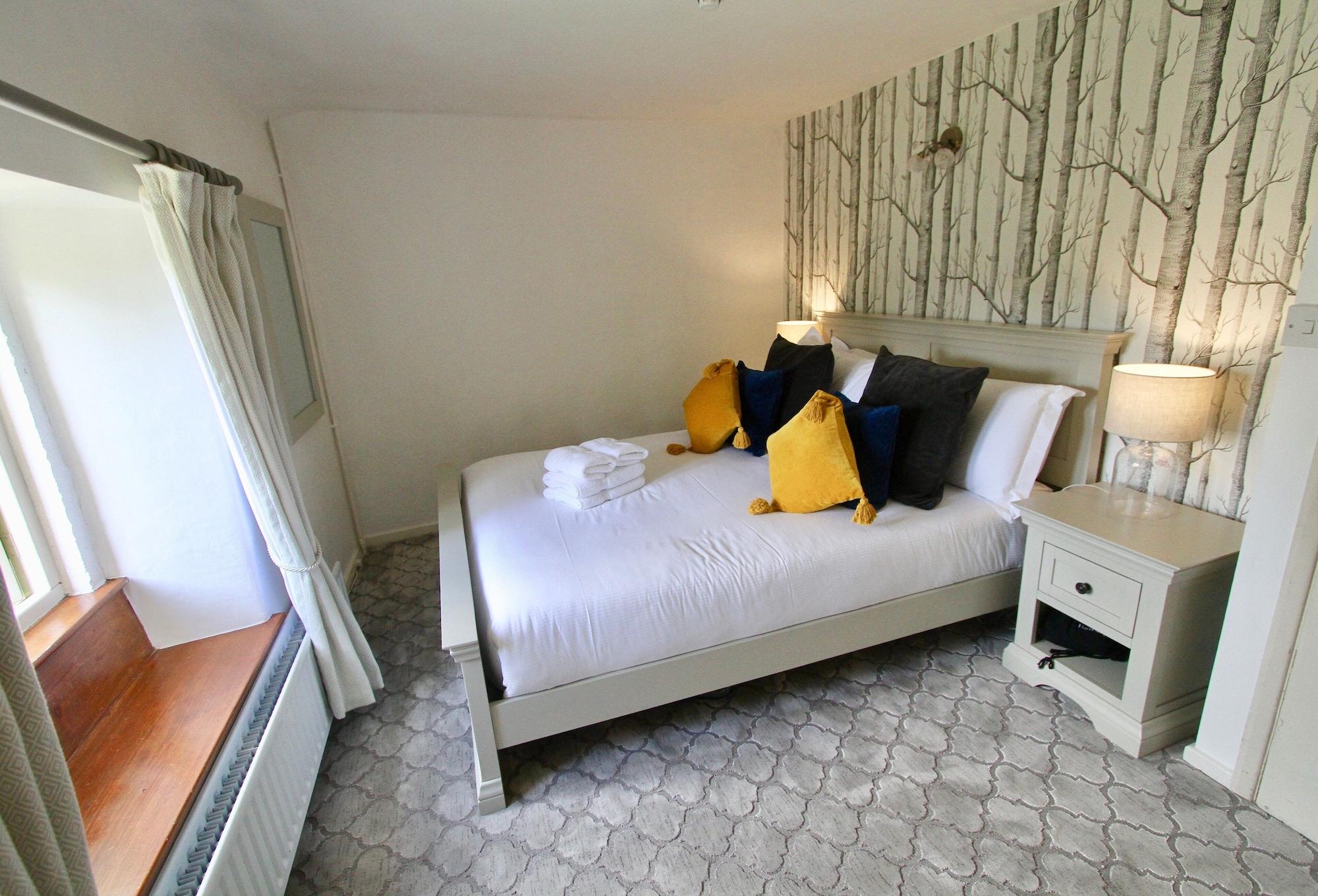 Ashfield House Hotel Grassington Kültér fotó A bedroom at The Old Inn