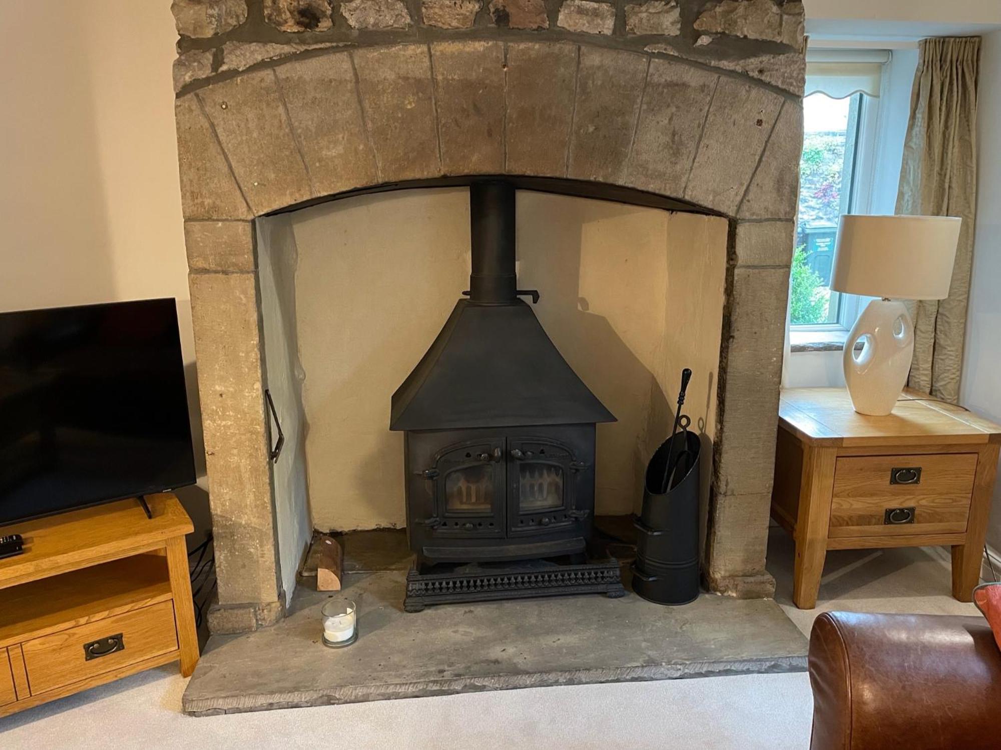 Ashfield House Hotel Grassington Szoba fotó The fireplace in the living room