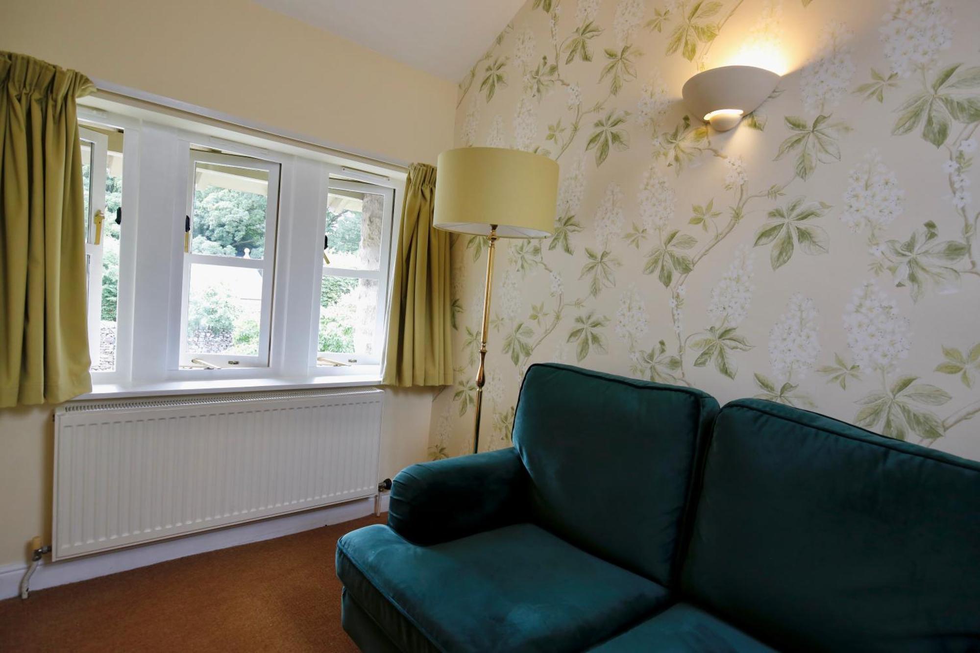 Ashfield House Hotel Grassington Szoba fotó A radiator in a living room